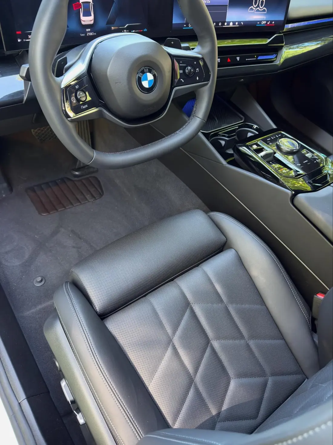Pristine black perforated leather BMW interior, hand-detailed by Joey at Joey's Precision Detailing in Hickory NC
