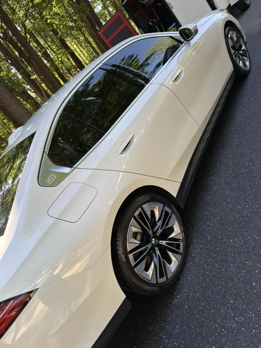White BMW i5 with mirror-finish paint correction by Joey's Precision Detailing in Hickory NC